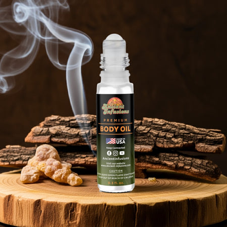Frankincense Body oil bottle with smoke and wood pieces on a wooden surface