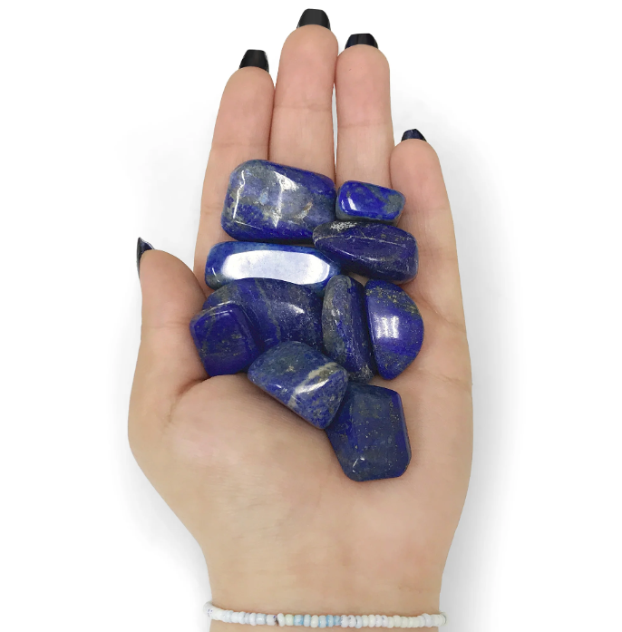 Comparison of tumbled lapis lazuli vs sodalite stones, highlighting their unique properties and uses.