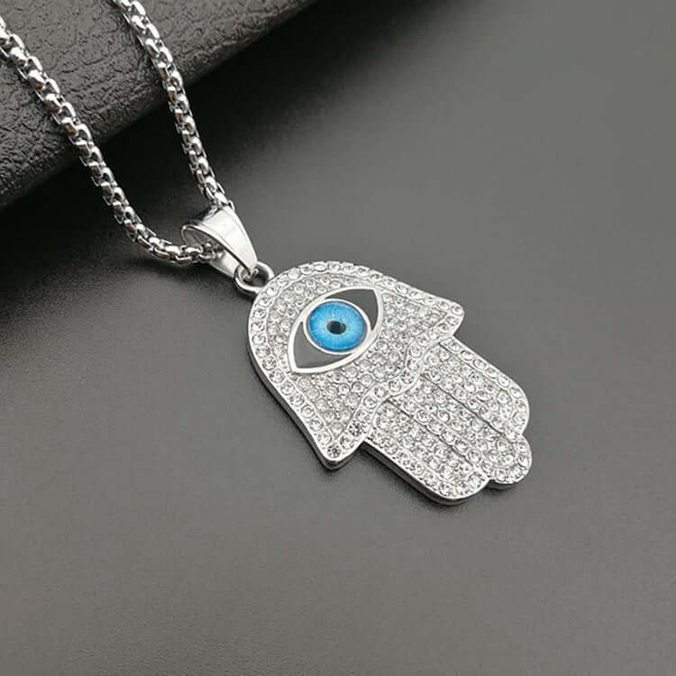 18k Gold-Plated Hamsa with Evil Eye Necklace Featuring Cuban Zircons and Stainless Steel Chain by Ancient Infusions.