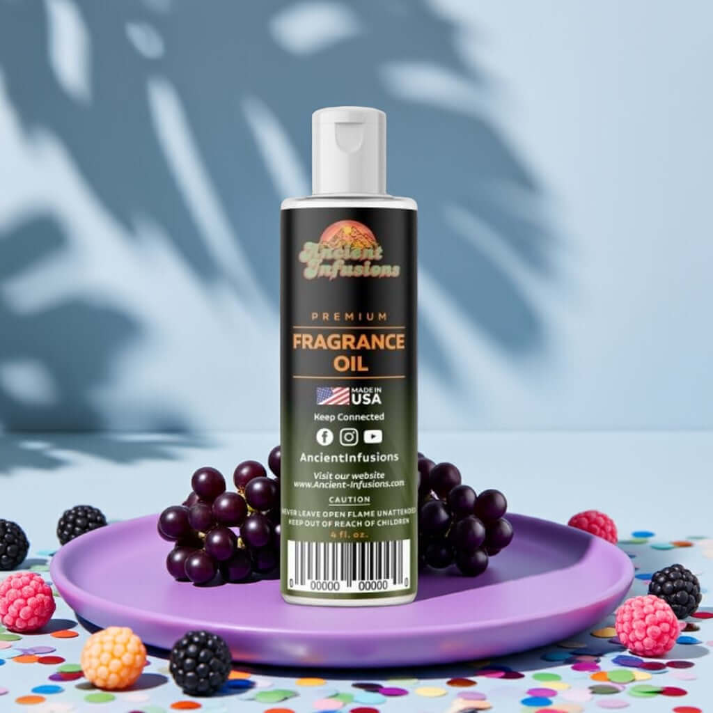 Grape Fragrance Oil bottle on colorful plate with grapes and candies, highlighting pure and bold scent.