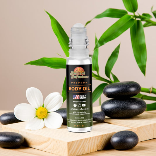 Gucci Bamboo Body oil bottle with bamboo leaves, stones, and a flower on a wooden surface.