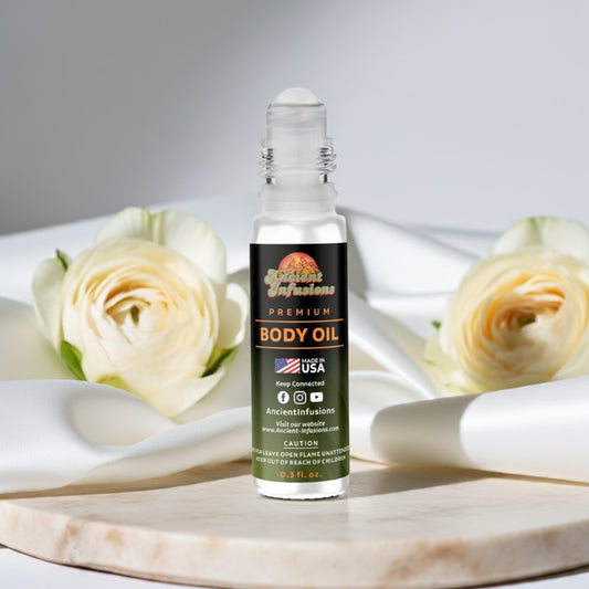 imported rose vanilla Bottle of premium body oil with roses on a white surface