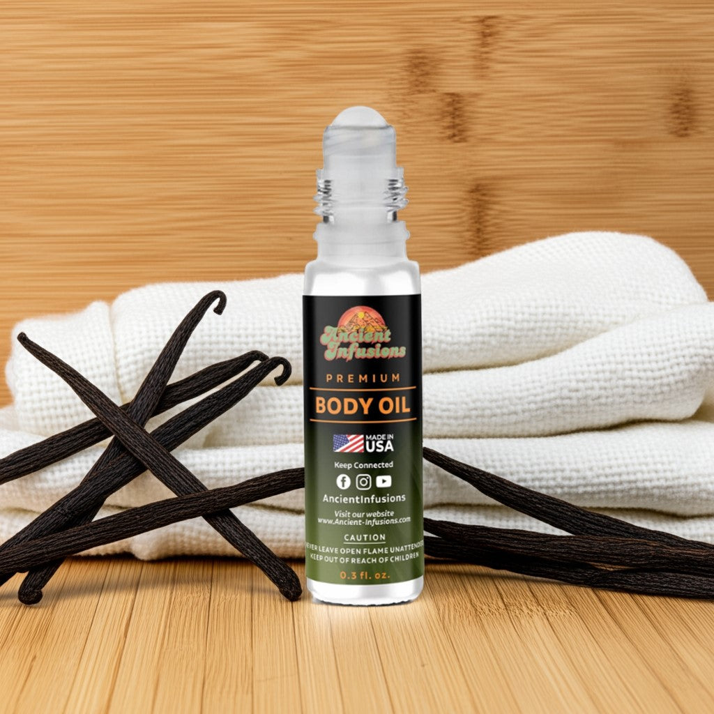 Imported Vanilla Musk Body oil bottle with vanilla beans and a towel on a wooden surface