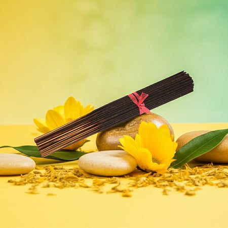 Lemon Incense Sticks with a yellow flower and stones on a yellow background