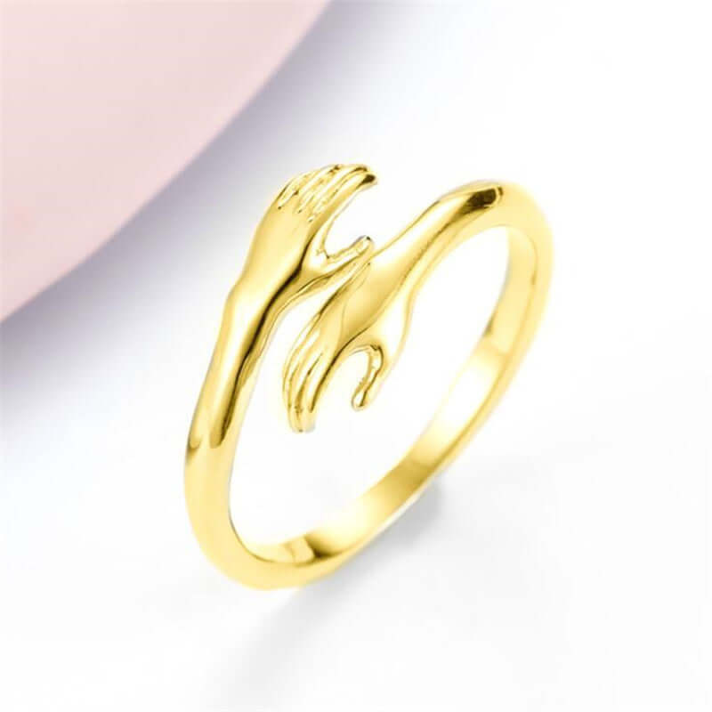 Men’s Adjustable Hugging Hands Ring in Alloy – Stylish and Meaningful Jewelry Piece.