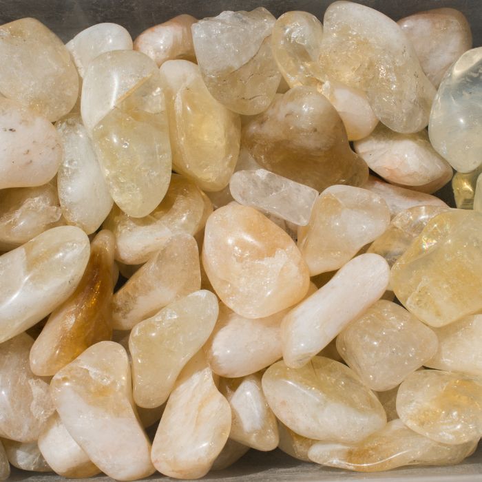 Citrine tumbled stones for sale, emphasizing their meaning, benefits, and availability online.