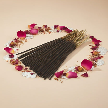Paris Hilton Pink Rush Inspired Incense Sticks with rose petals on a beige background