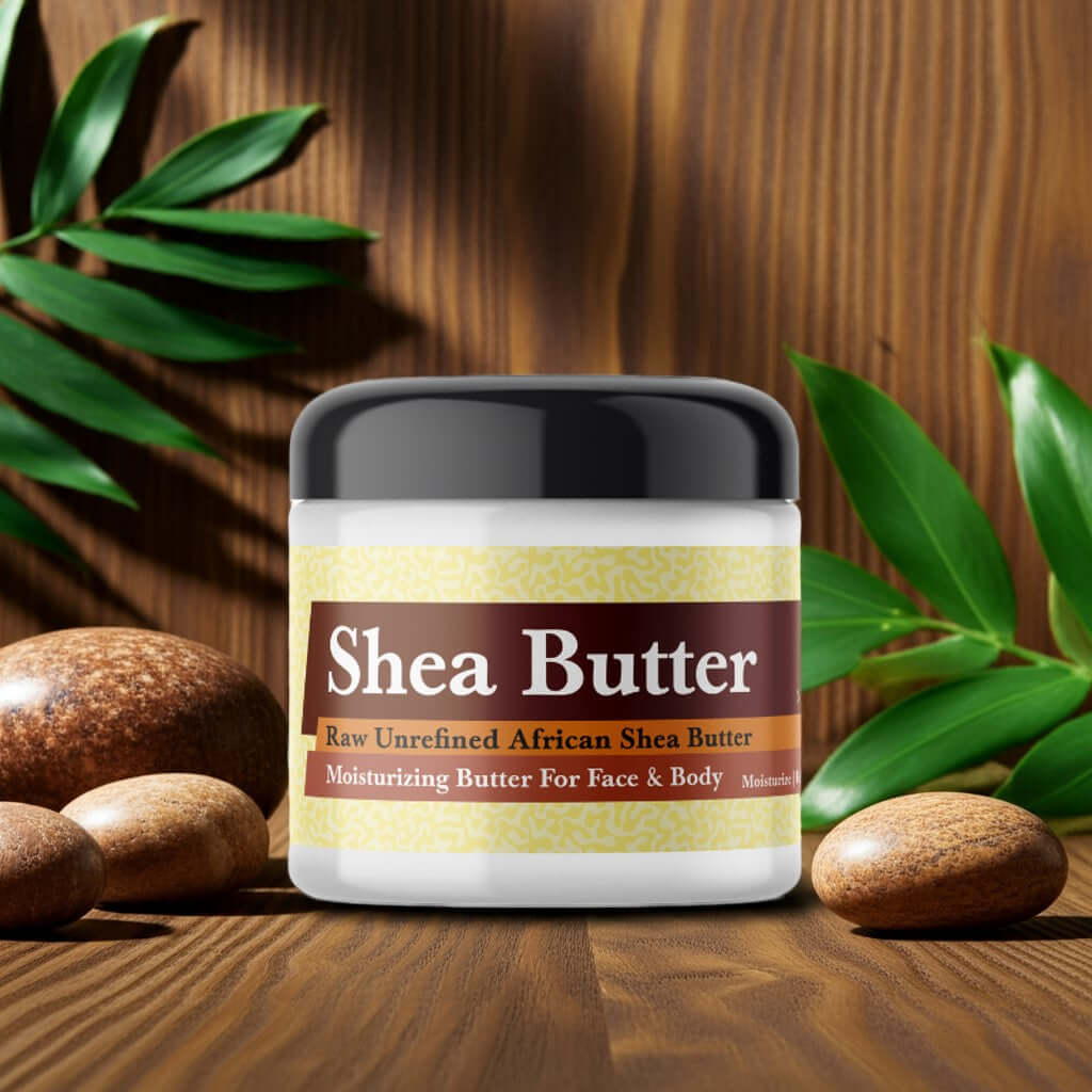 Arabian Sandalwood Scented Shea Butter in a jar with natural stones and green leaves backdrop