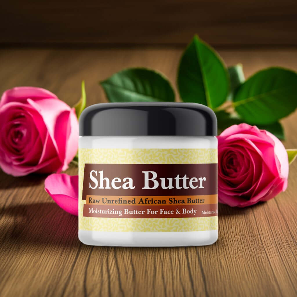 Baby Phat Goddess Inspired Scented Shea Butter jar with pink roses and green leaves on wooden background.