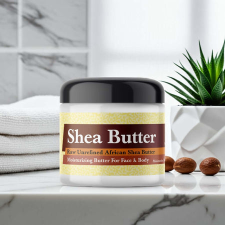 Coco Chanel Inspired Scented Shea Butter in bathroom setting with African shea nuts.