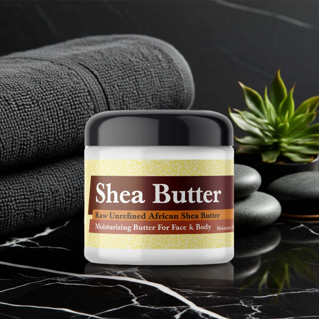 Mystery Man Scented Shea Butter jar on marble surface next to towels and stones for spa setting.