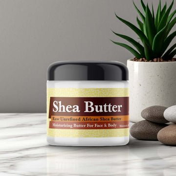 Nag Champa Scented Shea Butter in a jar, perfect for moisturizing face and body, placed on a marble surface with decorative stones.