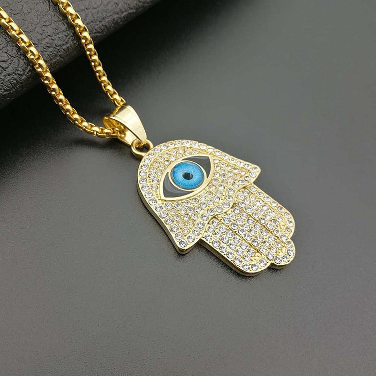 Unisex 18k Gold-Plated Hamsa with Evil Eye Necklace Featuring Cuban Zircons and Stainless Steel Chain by Ancient Infusions.