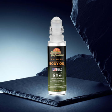 Sean John I Am King Inspired Body Oil in elegance, alcohol-free fragrance bottle on rocky background, premium body oil.