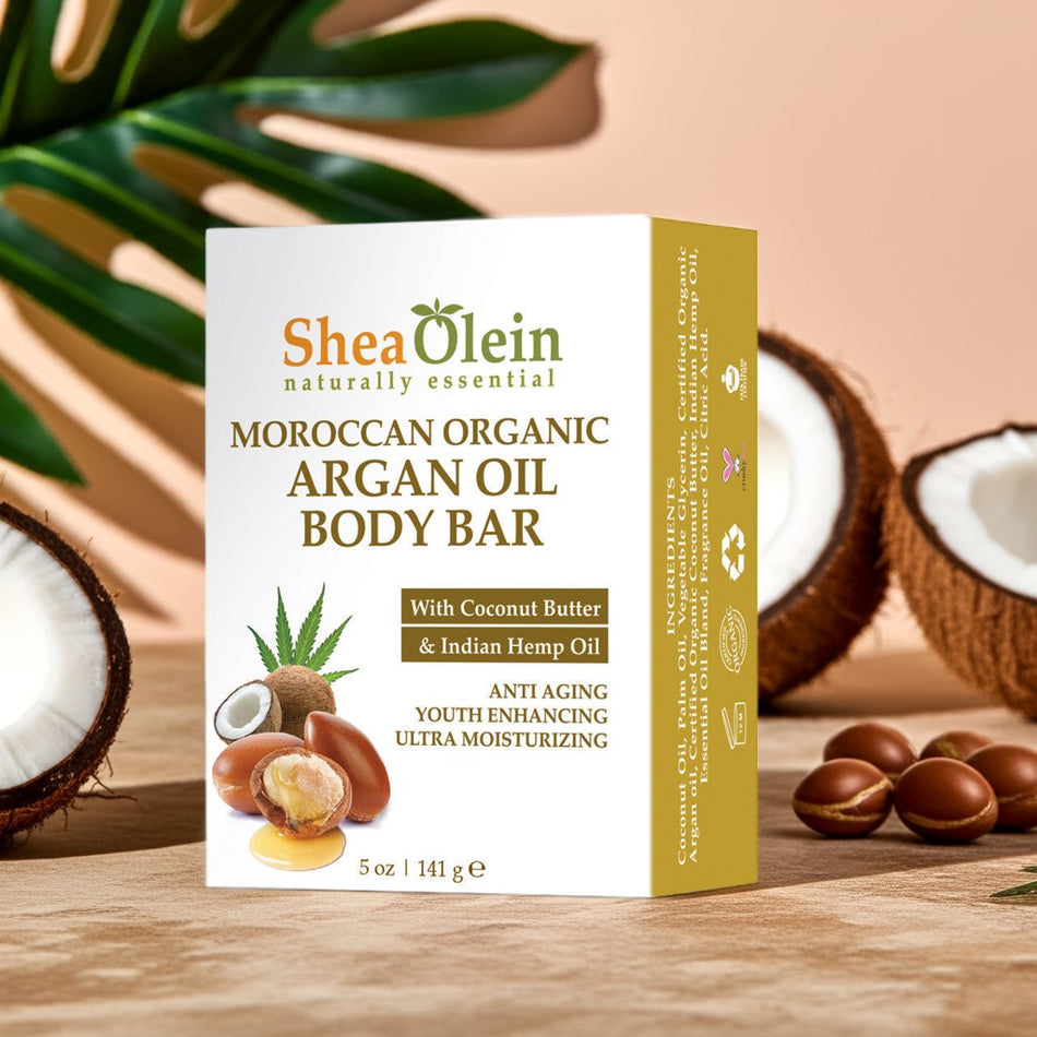 Shea Olein Moroccan Argan Oil Body Bar with coconut butter and hemp oil on spa countertop – anti-aging and deeply moisturizing soap bar.