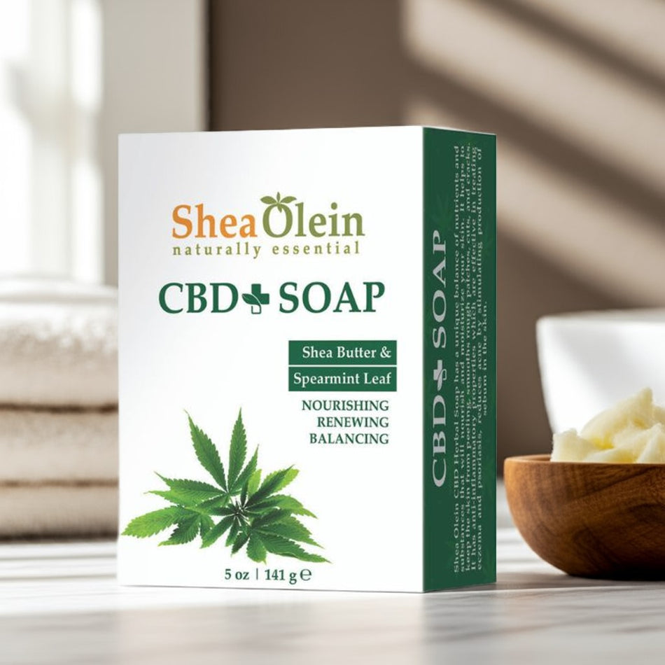 Shea Olein CBD Soap with shea butter and spearmint leaf on spa counter – nourishing, balancing, and calming for all skin types.