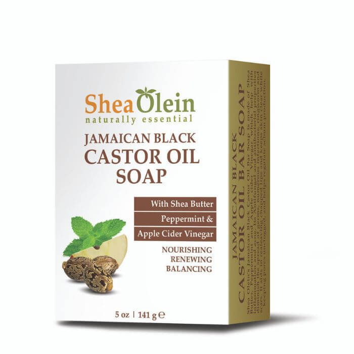 Shea Olein Jamaican Black Castor Oil Soap with peppermint and apple cider on wood surface – nourishing bar for balance and renewal.