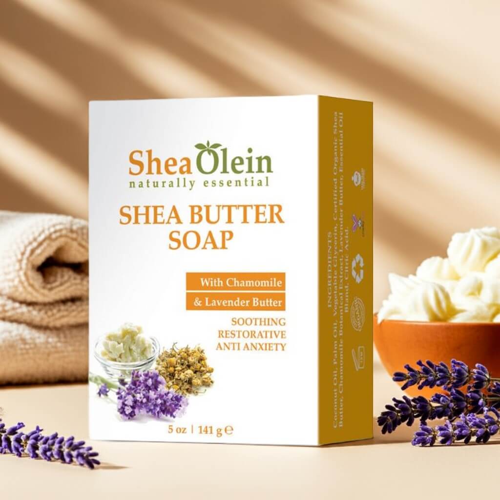 Shea Olein Shea Butter Soap with box, chamomile, lavender, and shea butter on beige counter – soothing and restorative body bar for dry, sensitive skin.