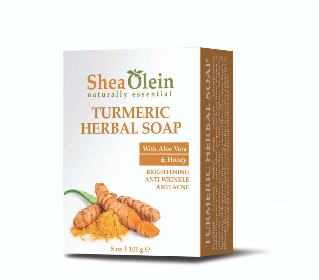 Shea Olein Turmeric Herbal Soap with aloe vera, honey, and turmeric root on a natural surface for brightening and anti-acne skincare.