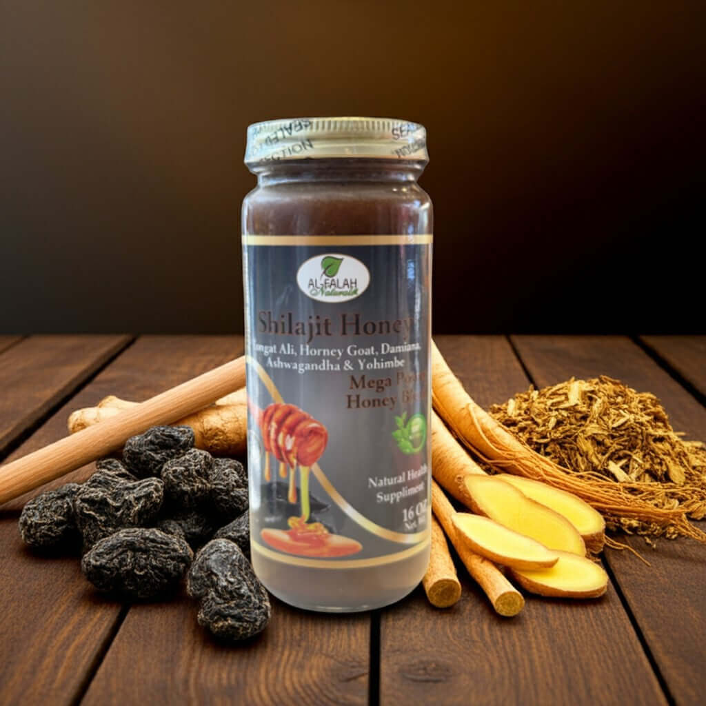 Shilajit Herbal Honey 16 oz. jar with honey dipper, herbs, and spices in natural setting