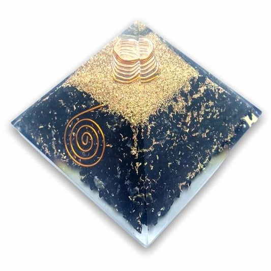 Shungite Orgone Pyramid for grounding, EMF protection, and energy shielding.