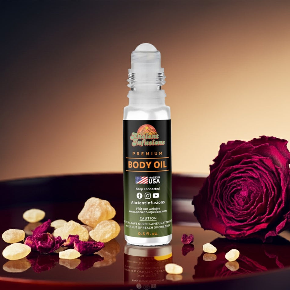 Somalian Rose uncut body oil on wooden platform with dried rose petals