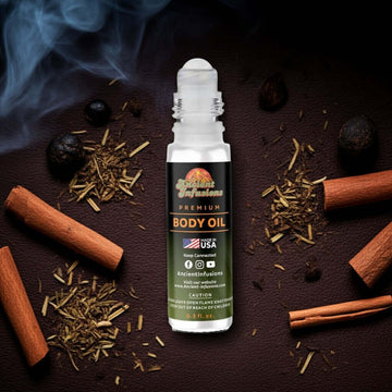 Tom Ford Tobacco Oud Inspired Body Oil with cinnamon and tobacco notes, luxurious scent bottle on textured background.