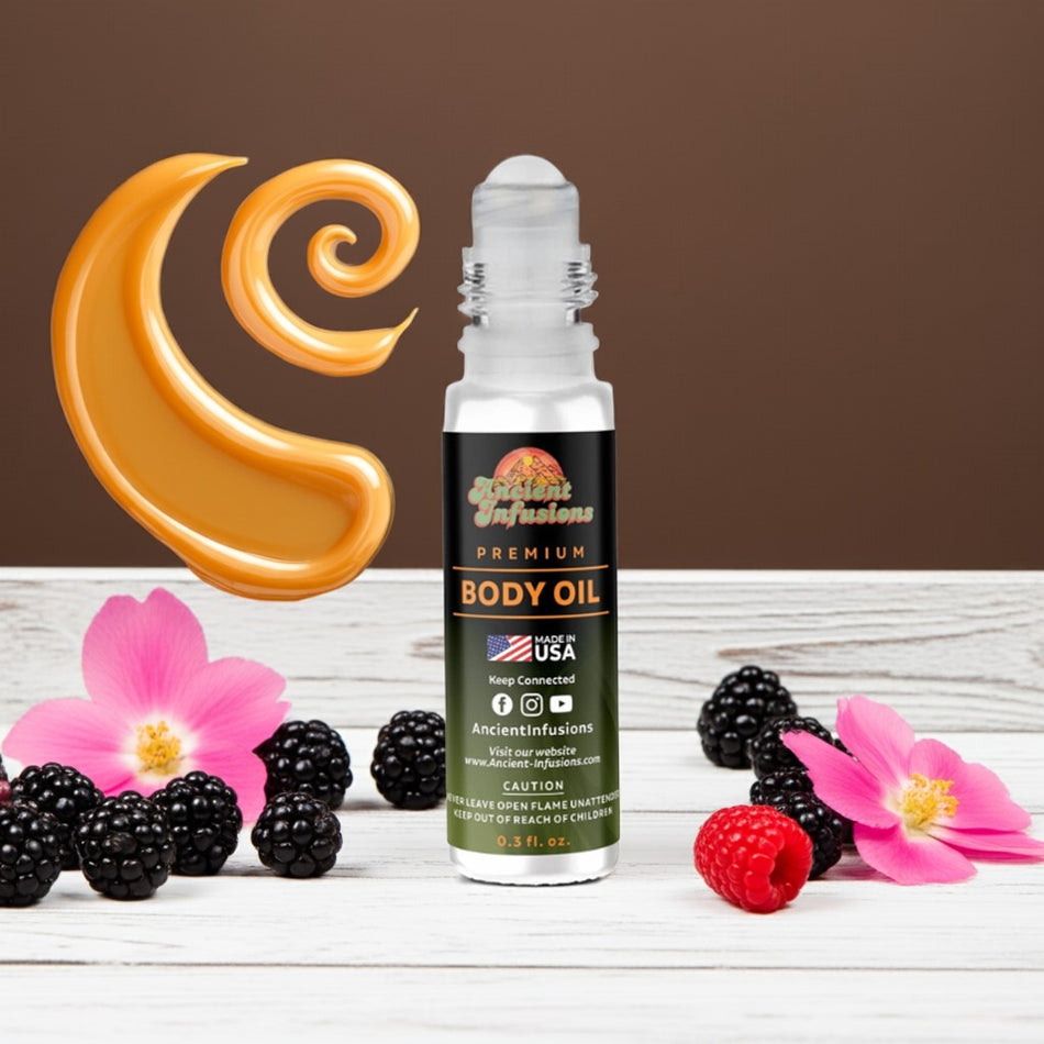 Viva La Juicy inspired body oil standing upright on white wood with berries and soft pink flowers