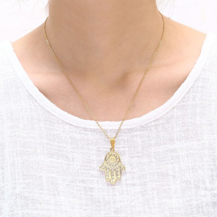 Gold and Silver Hamsa Hand Necklace with Evil Eye Pendant and Stainless Steel Chain by Ancient Infusions – Elegant Spiritual Jewelry.